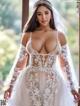 A woman in a wedding dress posing for a picture.